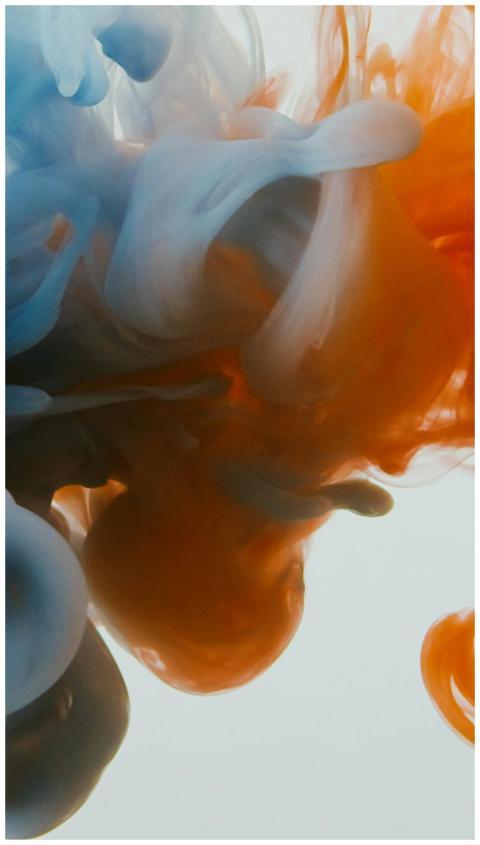 Dynamic abstract image with swirling blue and oran