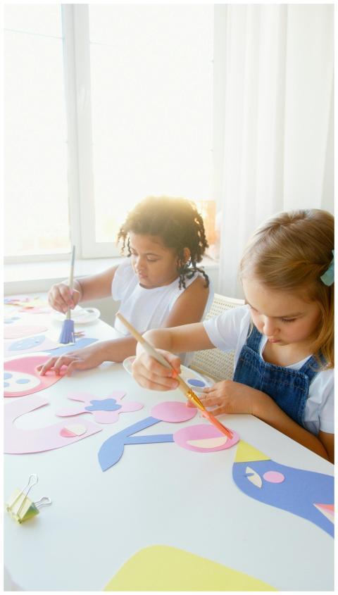 Children enjoying painting art projects with brigh