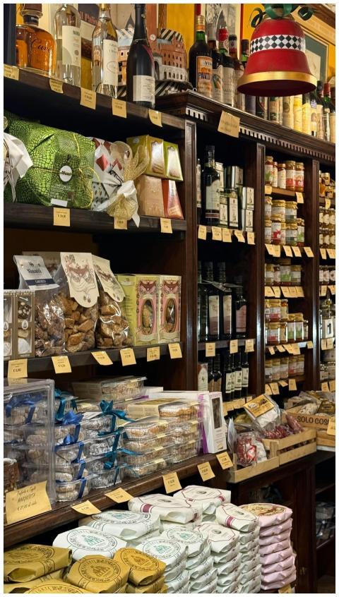 Vibrant assortment of gourmet goods in a warm, inv