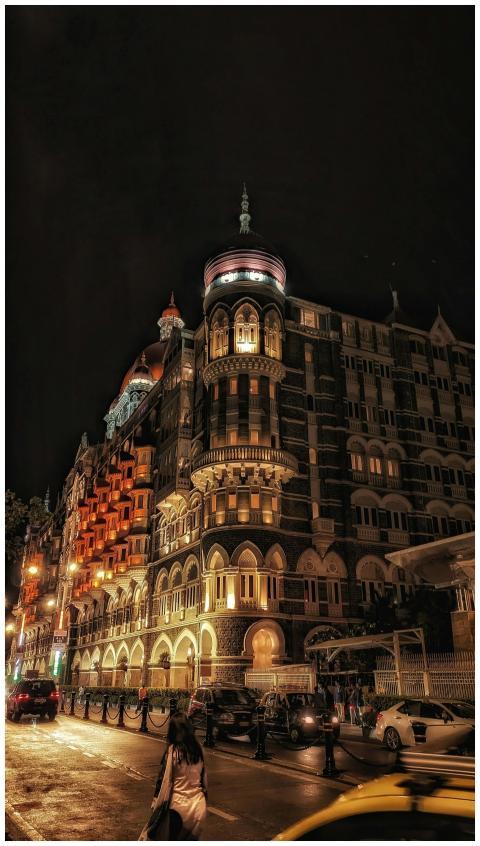 Illuminated night scene of The Taj Mahal Palace Ho