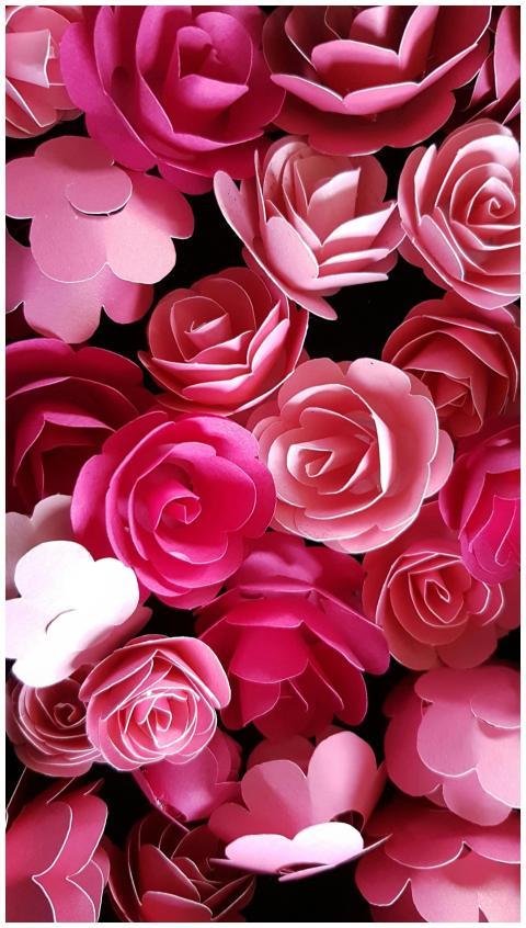 A striking arrangement of pink paper roses, perfec