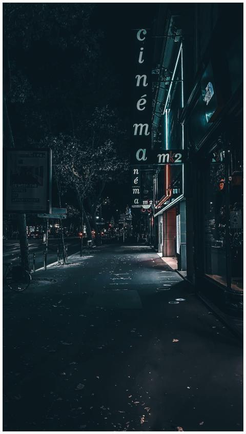 Atmospheric night shot of a quiet street with illu