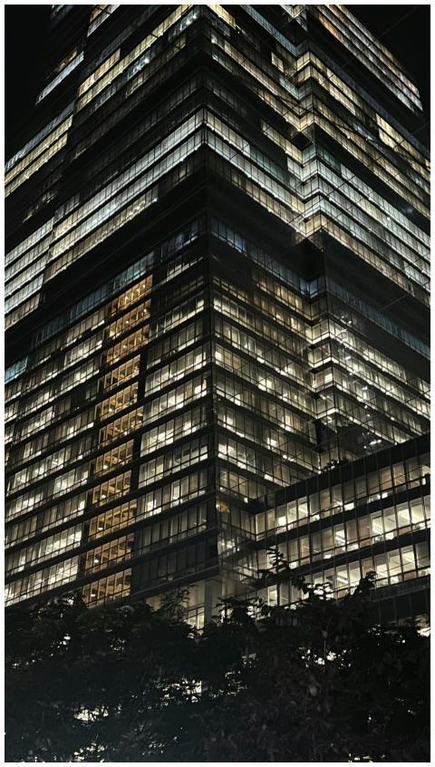 Illuminated Modern Skyscraper Night