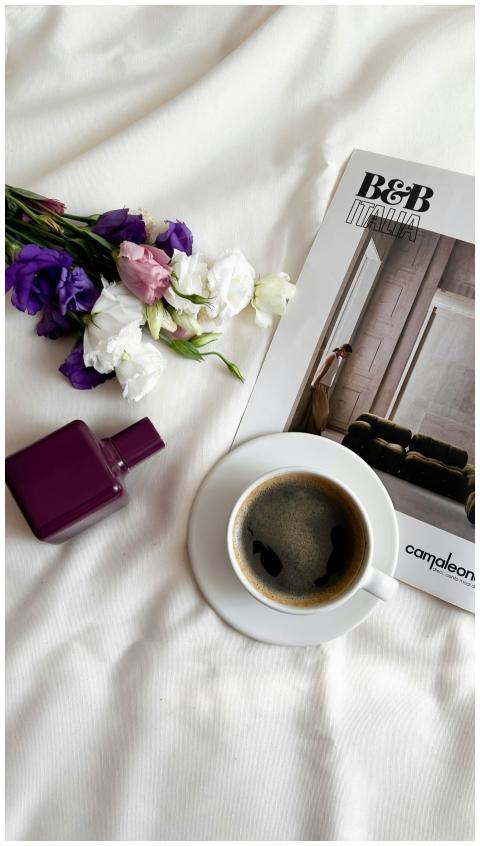 A stylish flat lay featuring coffee, a magazine, f