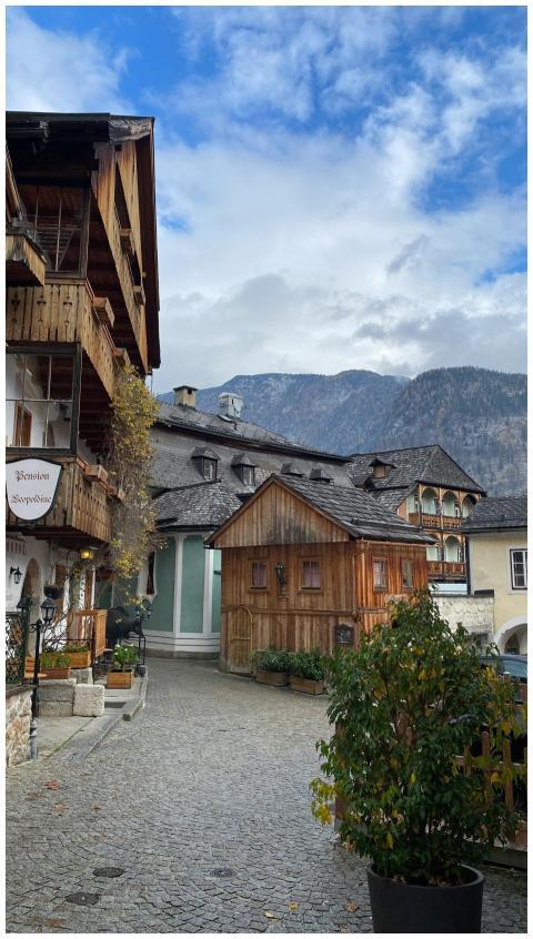 Rustic alpine village street with traditional wood