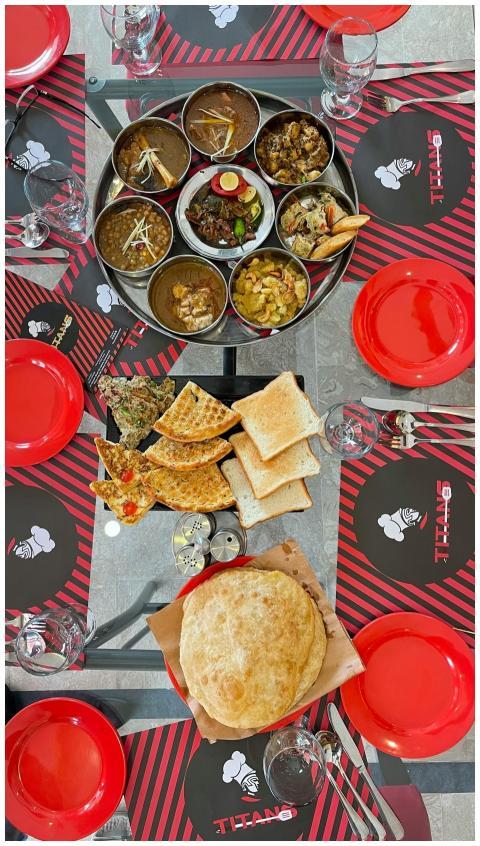 A vibrant flat lay of traditional Pakistani thali