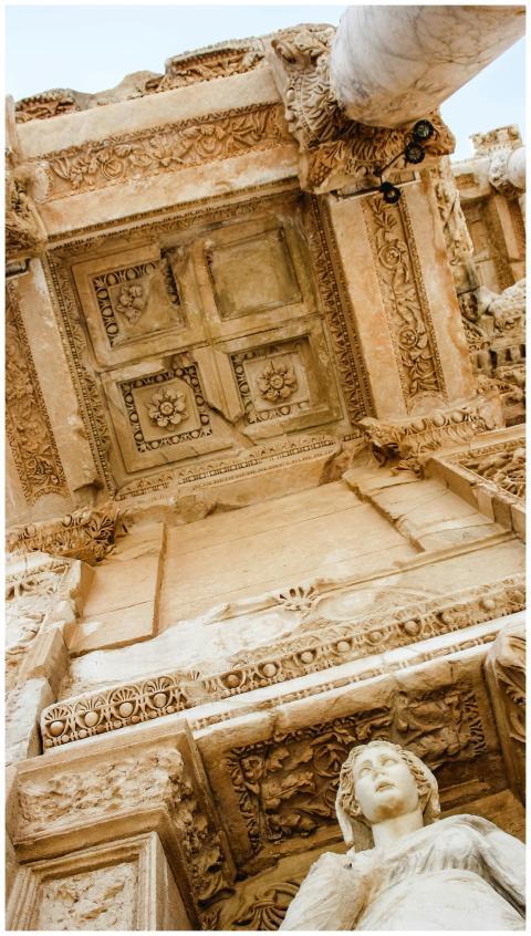 From below of Roman building with statue of Arete