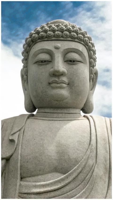 Close-up of a grand stone Buddha statue with a ser