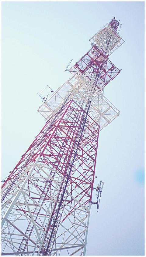 Low angle view of a red and white communication to