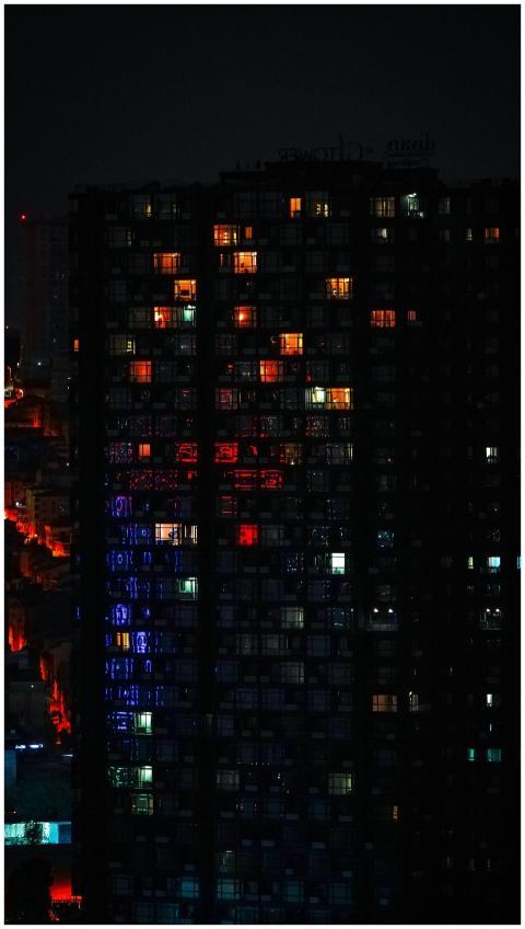 A striking view of a city building at night with v