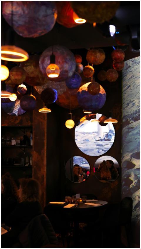 Warm, cozy ambiance inside a Paris restaurant with