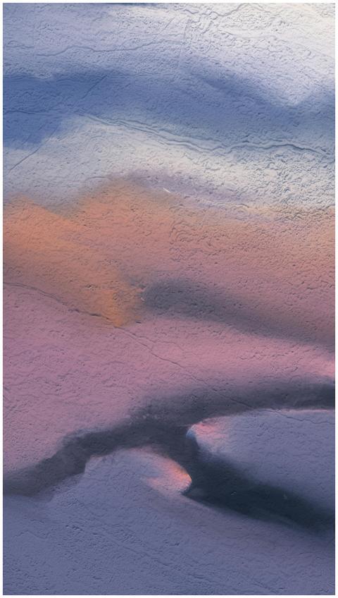 Vibrant abstract depiction of a textured gradient,