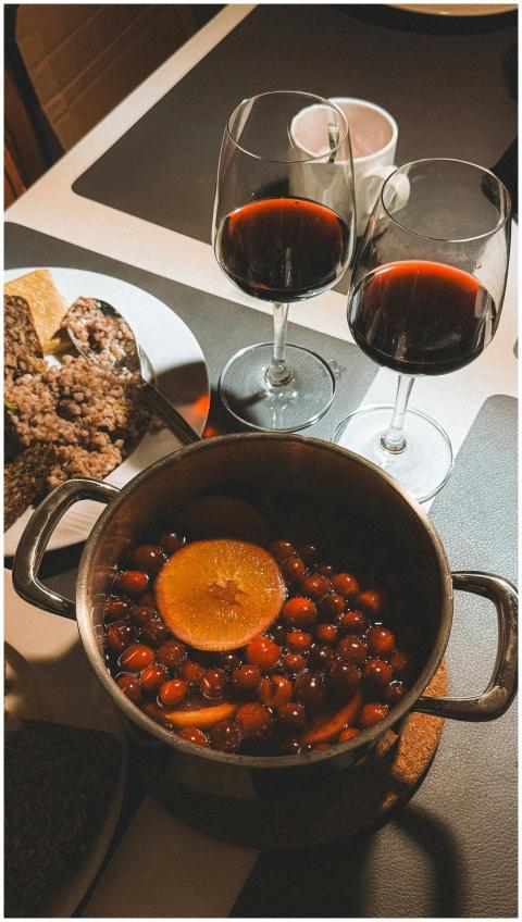 Warm evening setting with mulled wine and snacks,