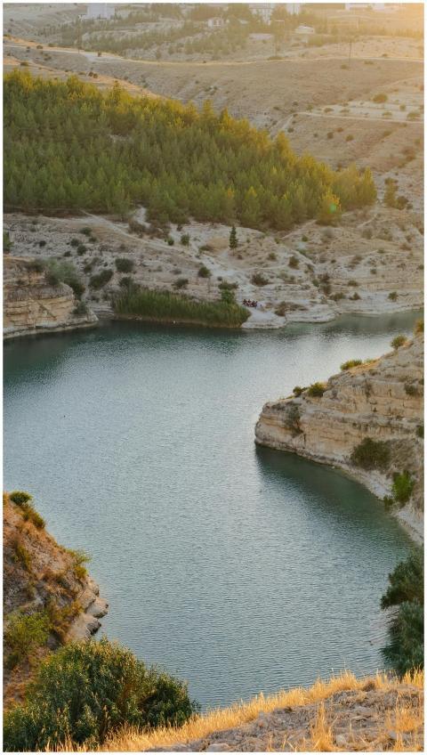A captivating vertical view of a peaceful lake sur