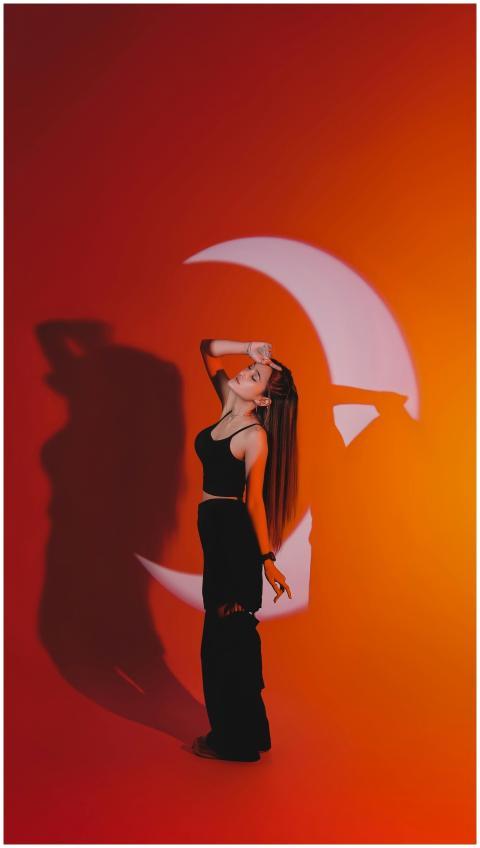 A captivating portrait of a woman in front of a cr