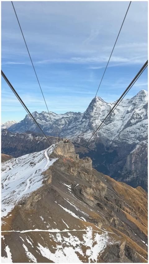A breathtaking aerial view of snow-capped mountain