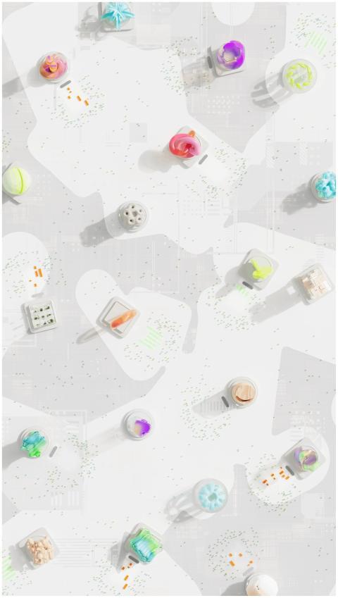 Creative flat lay of vibrant 3D objects on a white