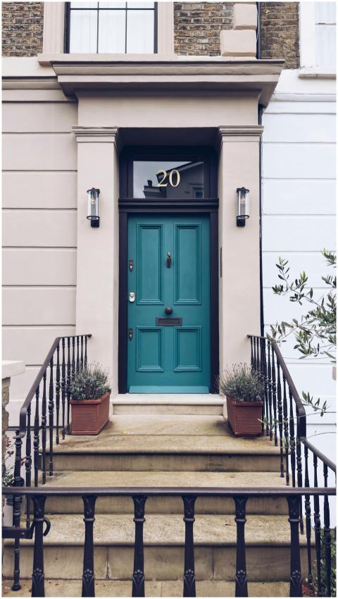 Elegant blue door entrance of a classic London tow