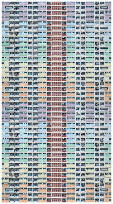 A colorful, modern residential building exterior i