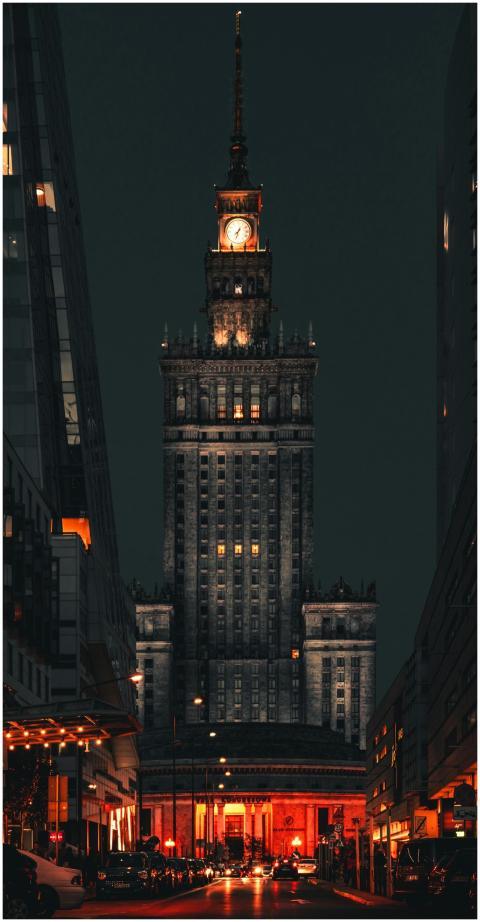 Stunning nighttime view of Warsaw's Palace of Cult