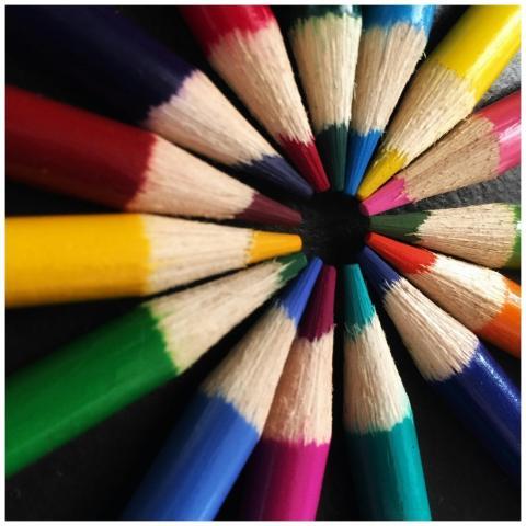 Colorful arrangement of pencils forming a circular