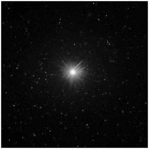 Bright star surrounded by a field of stars in São