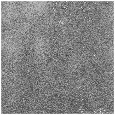 Close-up of a textured gray concrete wall surface,