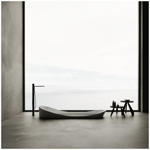 Sleek minimalist bathroom design featuring a batht