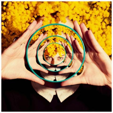 Creative conceptual portrait with mirrors and vibr