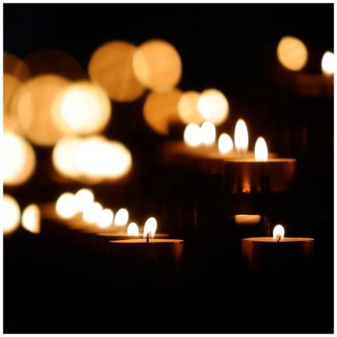 Soft focus on glowing candles with a charming boke