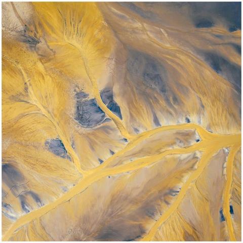 A stunning aerial view of yellow river patterns in