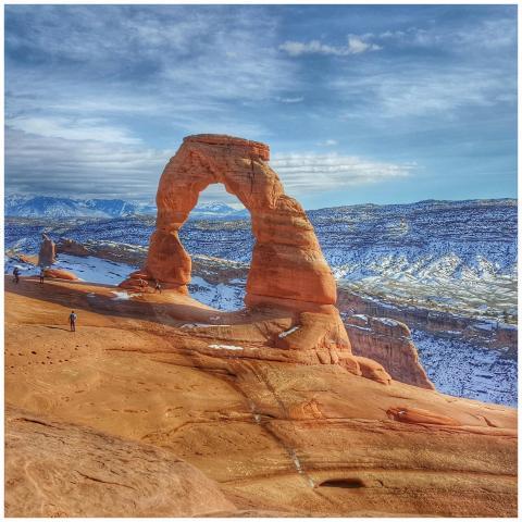 Delicate Arch in Moab, Utah, showcased against a w
