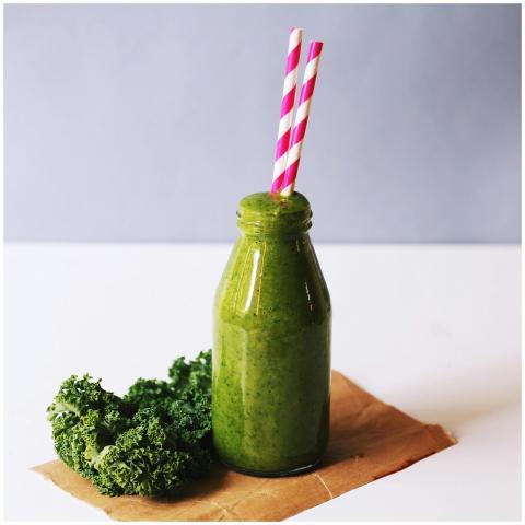 Energizing green smoothie with kale, served in a b
