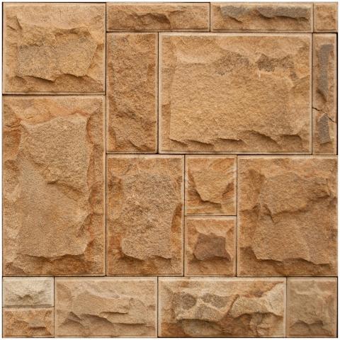 Rough stone wall featuring geometric patterns and