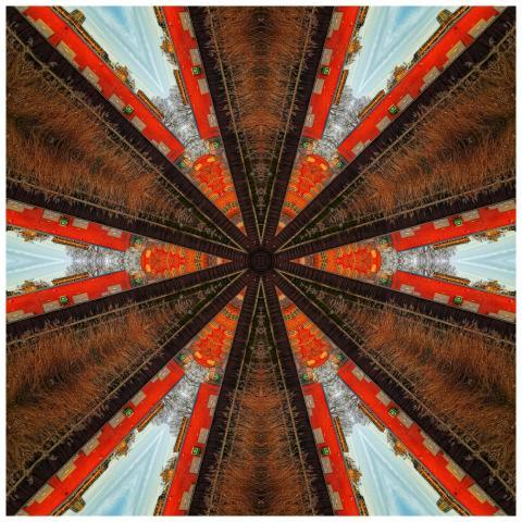 A vibrant abstract kaleidoscope design depicting a