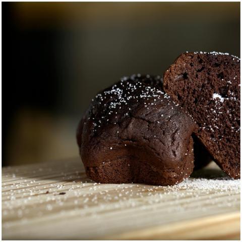 Close-up of rich chocolate muffins sprinkled with