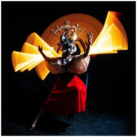 A vibrant Catrina performance with dramatic light