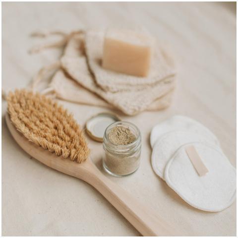Sustainable skincare items arranged as a flat lay