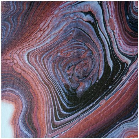 Close-up of a mesmerizing multicolor acrylic swirl