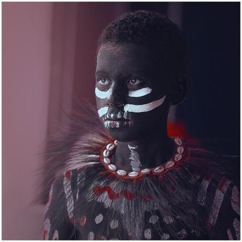 A captivating portrait of a child with tribal face