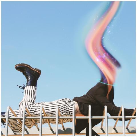 Surreal image of a woman posing with colorful effe