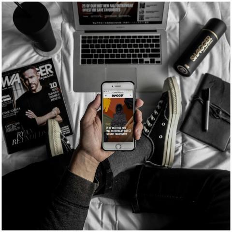 Overhead view of a stylish workspace with laptop,