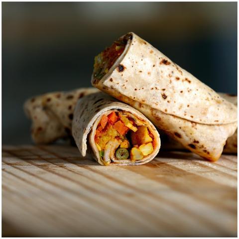 Delicious vegetarian wrap filled with colorful veg