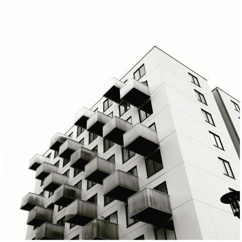 Low-angle view of a modern building with unique ge