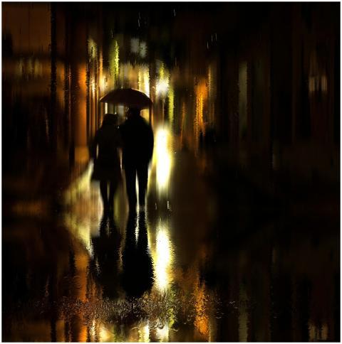 A couple with an umbrella walks on a rainy night s