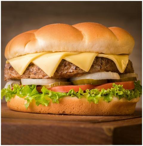 Close-up of a delicious cheeseburger with fresh to