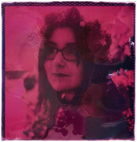 Creative pink-tinted portrait in instant film styl
