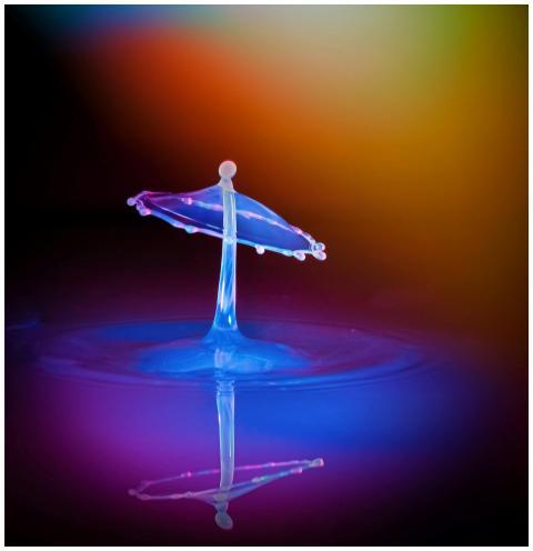 Colorful water drop collision captured in high spe