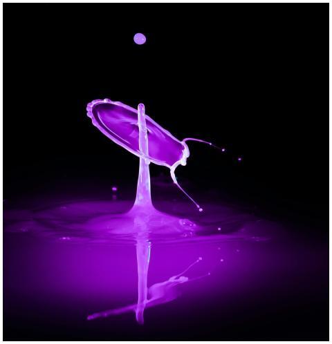 Captivating purple liquid splash creating artistic