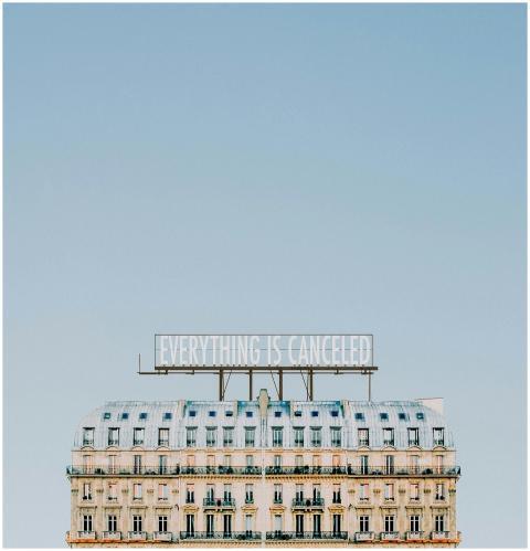 Architectural building facade with a sign reading